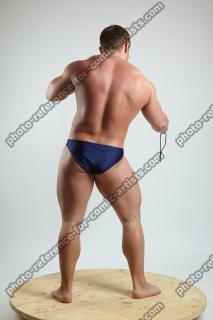 ADAM_WARD STANDING WITH TWO KNIVES